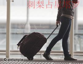 Woman carries your luggage at the airport terminal